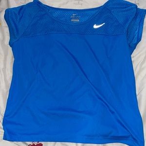small blue nike shirt